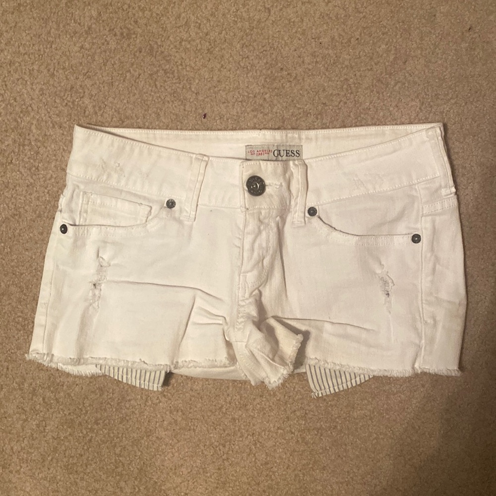 White, low-rise jean shorts.